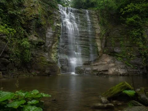 Waterfall into jungle Stock Photos