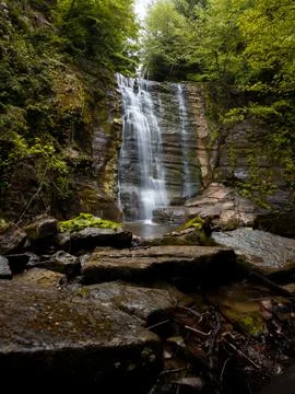 Waterfall into jungle Stock Photos
