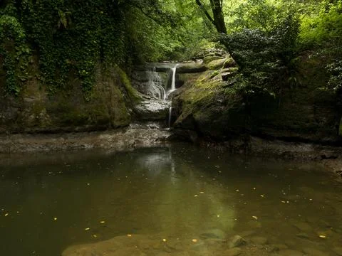 Waterfall into jungle Stock Photos