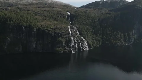 Waterfall into lake Stock Footage 252258599