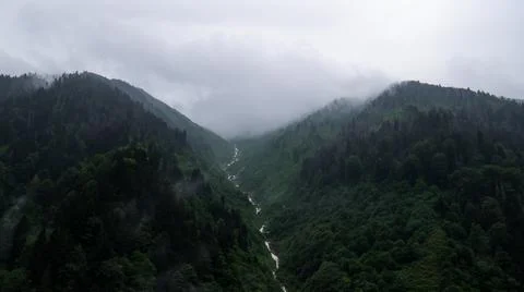 Waterfall lake mountain clouds view Stock Photos