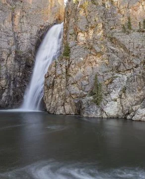 Waterfall into lake Stock Photos