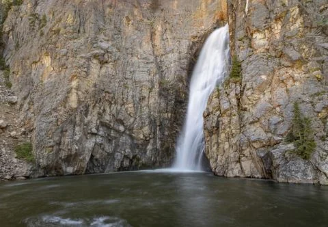 Waterfall into lake Stock Photos