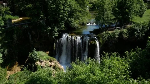 Waterfall in a little town Stock Footage 76581529