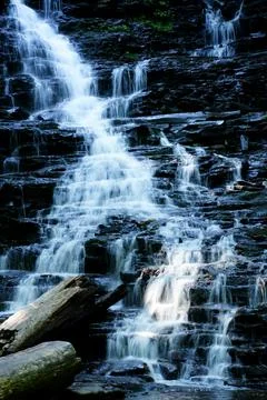 Waterfall with log Foto stock