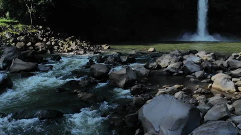 Waterfall Lontar has a height of 35 meters and is a source of hydropower power Stock Footage 147427323