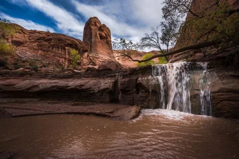 Waterfall on a lower section of the Coyote Gulch Stock Photos