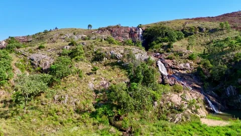 Waterfall in Lush Green Landscape Video stock 296542266