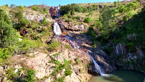 Waterfall in Lush Green Landscape Video stock 296542269