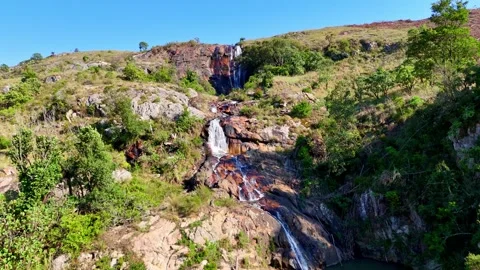 Waterfall in Lush Green Landscape Video stock 296542271