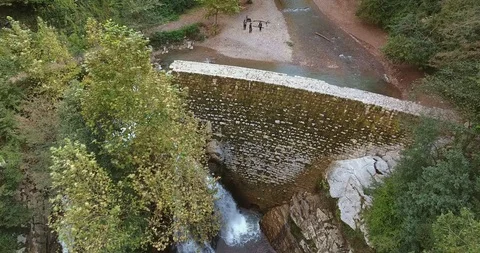 WATERFALL IN THE LUSH VALLEY Stock Footage 110773521