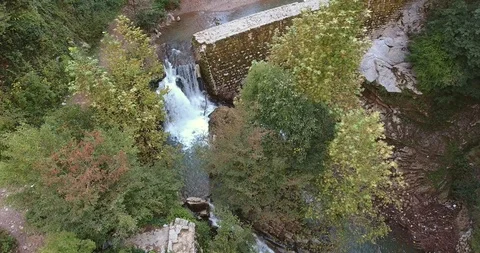 WATERFALL IN THE LUSH VALLEY Stock Footage 110774257