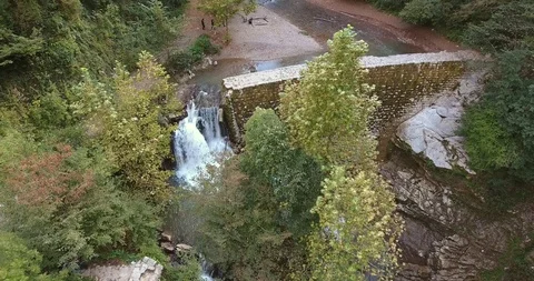 WATERFALL IN THE LUSH VALLEY Video stock 110774398