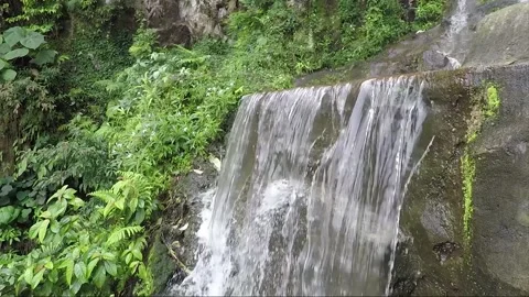 Waterfall at Main Temple cave, Batu caves, Selangor, Kuala Lumpur, Malaysia Stock Footage 194437300