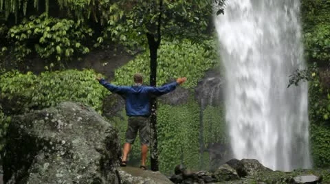 Waterfall,  man Video stock 11428424
