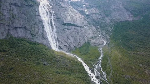 Waterfall of melting glacier at Briksdalsbreen glacier in nature of Norway Stock Footage 132049830