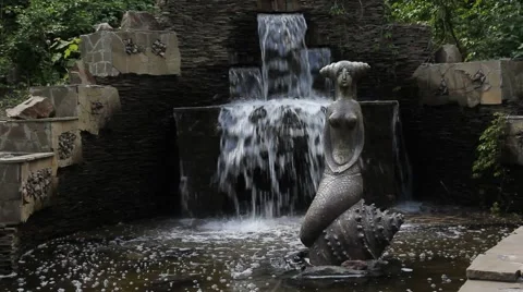 Waterfall with a mermaid Stockbeeldmateriaal 50150150