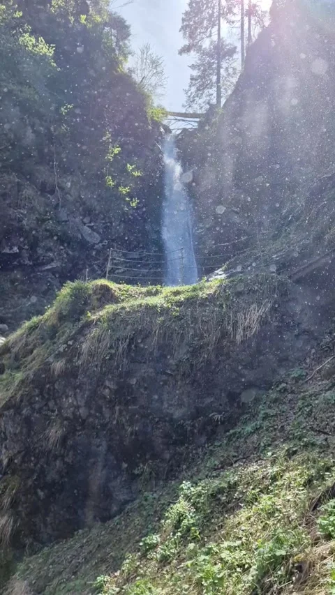 Waterfall Mist and Cool Droplets in the Mountains Video stock 312216332