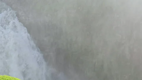 Waterfall mist rising from powerful stream Stock Footage 319270427