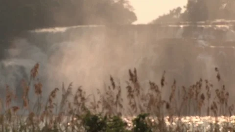 Waterfall mist at sunrise / sunset Stock-Footage 84714927