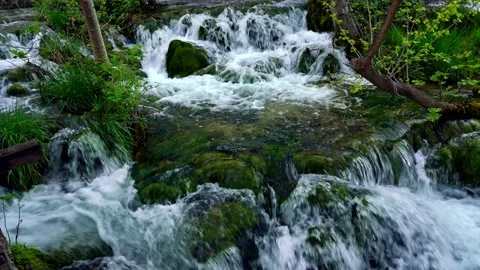 Waterfall with mossy rocks Stock Footage 153536516