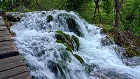 Waterfall with mossy rocks Stock Footage 153536604