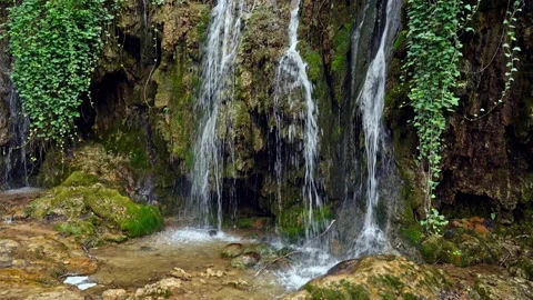 Waterfall with mossy rocks Stock Footage 153536903