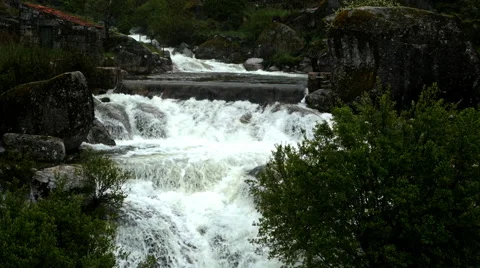 Waterfall in the mountain with camera movement Stock Footage 65063985