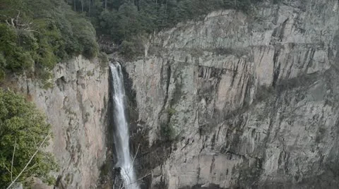 Waterfall on mountain cliff Stock Footage 22147827