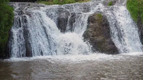 Waterfall mountain close water rocks in summer Stock Footage 77541398