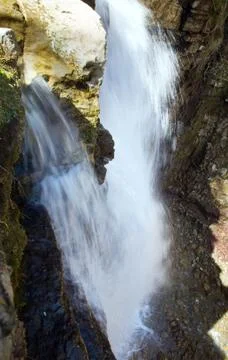 Waterfall on mountain forest Stock Photos