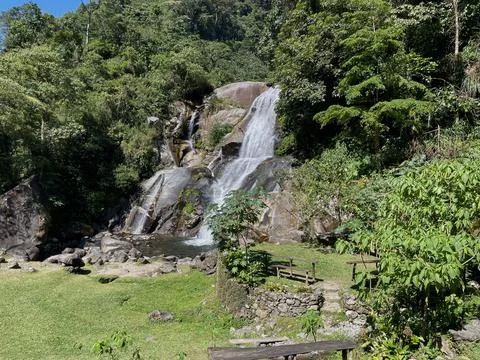Waterfall in the mountain forest Stock Photos