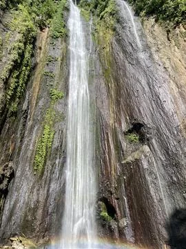 Waterfall in the mountain forest Stock Photos