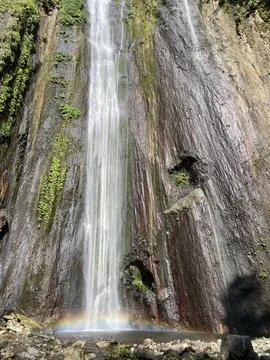 Waterfall in the mountain forest Stock Photos