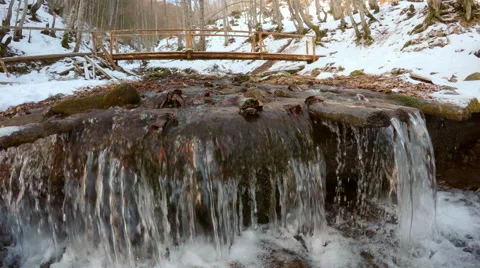 Waterfall in mountain locality in winter Stock Footage 46493895