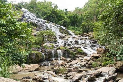 Waterfall in mountain. Stock Photos