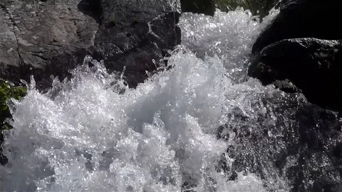 Waterfall on the mountain river, bouncing over boulders gray Stock Footage 96711607