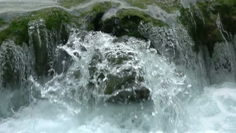 Waterfall on a Mountain River Close-up. Slow Motion Видео 106464933