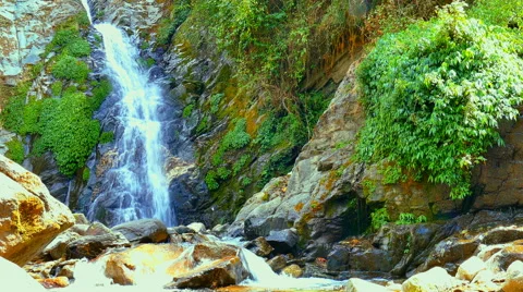 Waterfall mountain river Nepal. Water falling rocks Nature background 4k video. Stock Footage 64821839