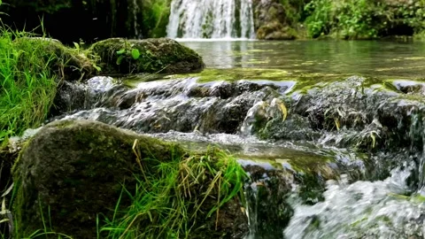 Waterfall on mountain river. Panoramic beautiful deep forest waterfall Stock Footage 161216258