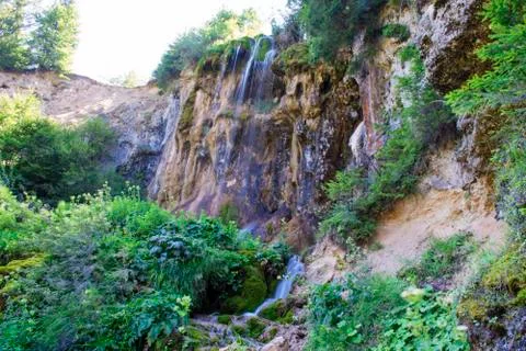 Waterfall on mountain river Stock Photos
