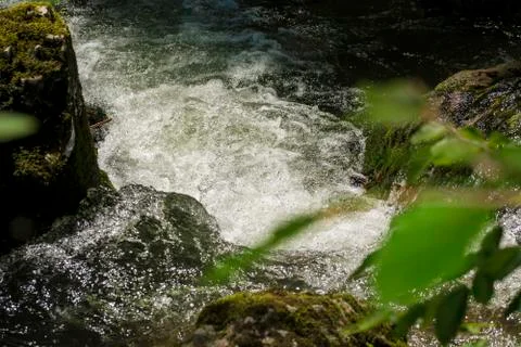 Waterfall on mountain river Stock Photos