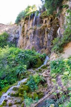 Waterfall on mountain river Stock Photos