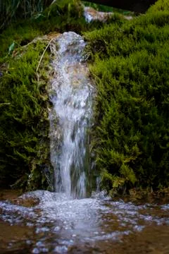 Waterfall on mountain river Stock Photos