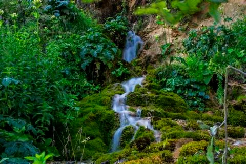 Waterfall on mountain river Stock Photos