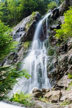Waterfall on mountain river Stock Photos