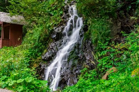 Waterfall on mountain river Stock Photos
