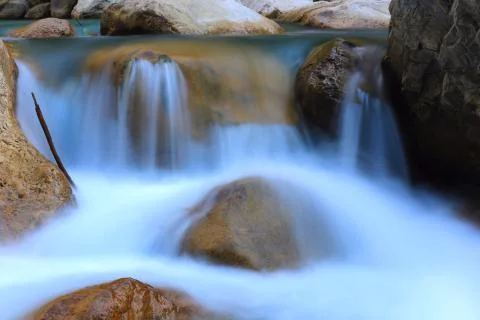 Waterfall on mountain river Stock Photos