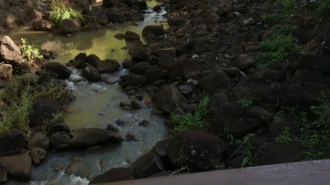 The waterfall in the mountain seen from a distance Stock Footage 105442924