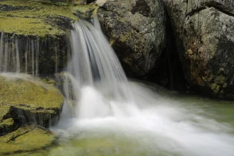 Waterfall on mountain stream 스톡 사진